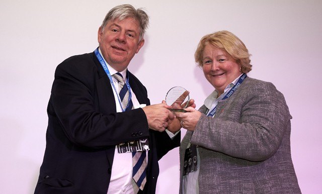 Clem Chambers receiving an award